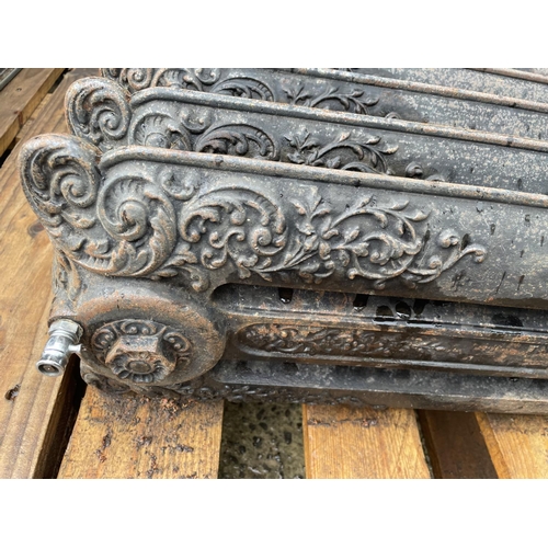 108A - A DECORATIVE VINTAGE CAST IRON RADIATOR