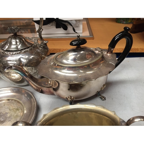 17 - A SELECTION OF SILVER PLATED ITEMS TO INCLUDE TEA POTS, SUGAR BOWL AND TWO FURTHER ITEMS