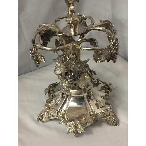 3 - AN ORNATE SILVER PLATED EPERGENE WITH GLASS FLUTE
HEIGHT 65CM