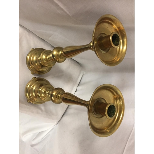 48 - A PAIR OF TALL BRASS CANDLESTICKS
HEIGHT 56CM