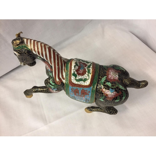 9 - A CHINESE BRONZE CLOISONNE ENAMEL AND GILT HORSE