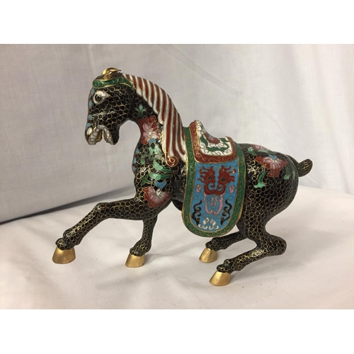 9 - A CHINESE BRONZE CLOISONNE ENAMEL AND GILT HORSE