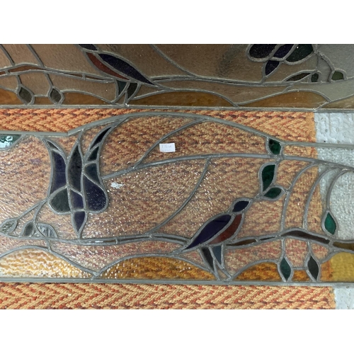 176A - TWO LEADED COLOURED GLASS PANELS 99CM X 41CM