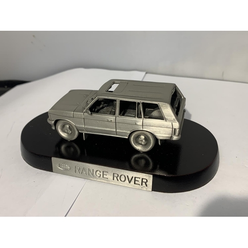 191 - A PEWTER RANGE ROVER ON A PLINTH WITH A BOX
