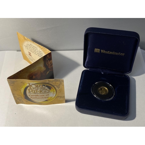307 - AN ISLE OF MAN “THE LORD OF THE RINGS”, 2003, GOLD CROWN, 1/25 OUNCE, .999 BU. THE COIN IS ENCAPSULA... 