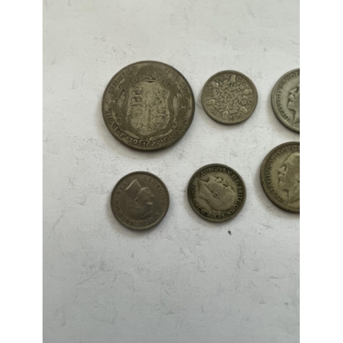 501 - A 1922 HALF CROWN, FOUR PRE 1947 SHILLINGS AND SIX PRE 1947 SIXPENCES