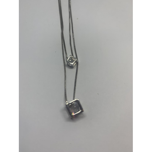 527 - A DOUBLE STRAND SILVER NECKLACE WITH CLEAR STONE CUBE PENDANTS AND A SILVER RING WITH CLEAR STONE IN... 