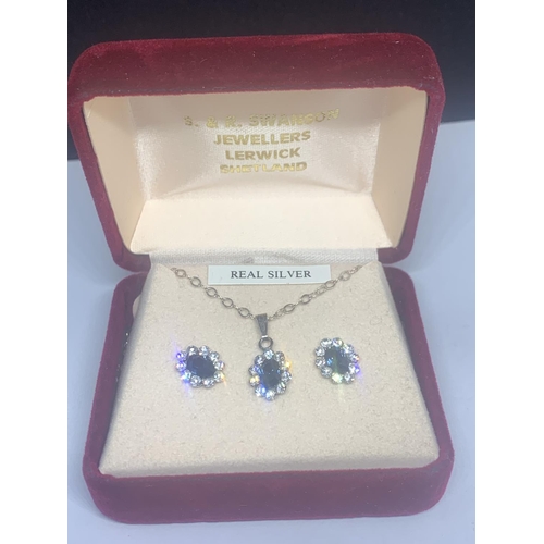 532 - A BOXED SILVER NECKLACE AND EARRING SET WITH BLUE STONE CENTRES SURROUNDED BY CLEAR STONES