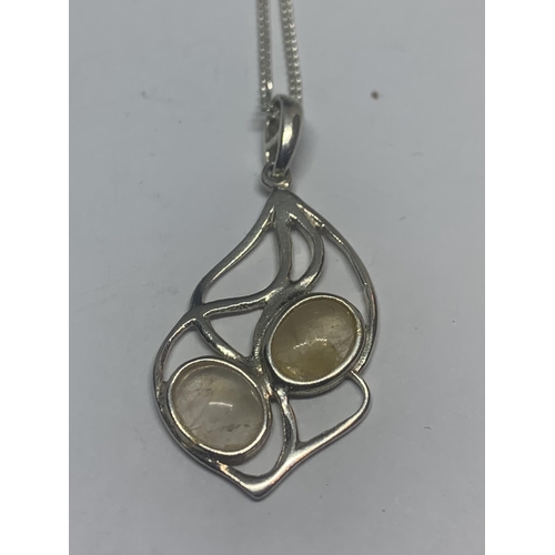 535 - THREE SILVER NECKLACES WITH PENDANTS TO INCLUDE A SPIDER ETC WITH A PRESENTATION BOX