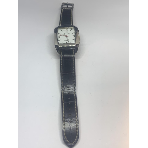 539 - A LOUIS VALENTIN WRIST WATCH WITH BLACK LEATHER STRAP SEEN WORKING BUT NO WARRANTY