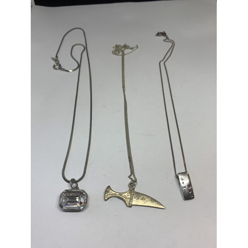 550 - THREE SILVER NECKLACES WITH PENDANTS