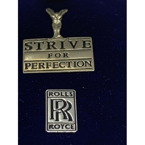 566 - TWO BOXED SILVER ROLL ROYCE BADGES