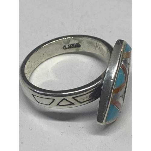 581 - A SILVER RING WITH A NAVAJO STONE DESIGN IN A PRESENTATION BOX