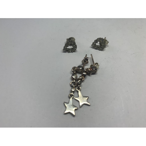 586 - SIX PAIRS OF SILVER EARRINGS IN A PRESENTATION BOX TO INCLUDE HOOPS, SQUARES, STARS ETC