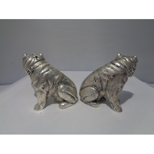 620 - A PAIR OF HEAVY SILVER PLATED BULLDOG DESIGN CRUETS