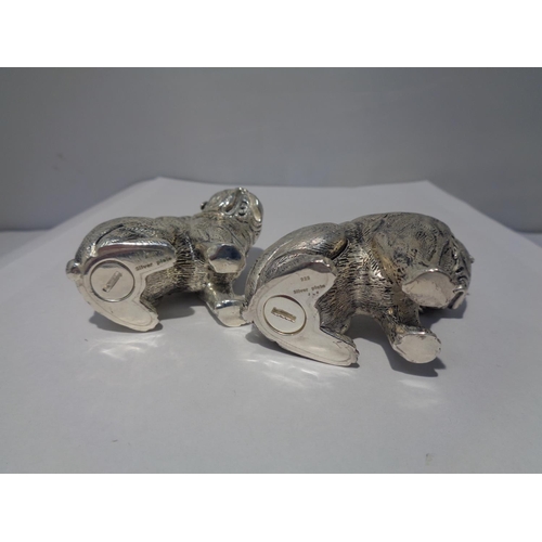 620 - A PAIR OF HEAVY SILVER PLATED BULLDOG DESIGN CRUETS