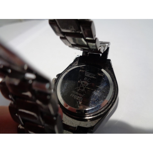 624 - A WRIST WATCH SEEN WORKING BUT NO WARRANTY