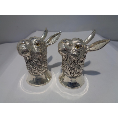 629 - A PAIR OF HEAVY SILVER PLATED HARE DESIGN SALT POTS