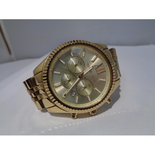 638 - A GILT CHRONOGRAPH FASHION WATCH SEEN WORKING BUT NO WARRANTY