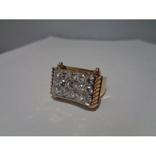 639 - A HEAVY 18 CARAT GOLD RING WITH FIFTEEN DIAMONDS SET IN A RECTANGLE OF DIAMOND CHIPS GROSS WEIGHT 13... 