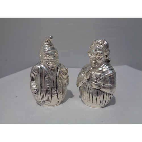 642 - A PAIR OF SILVER PLATED CRUETS IN THE DESIGN OF PUNCH AND JUDY