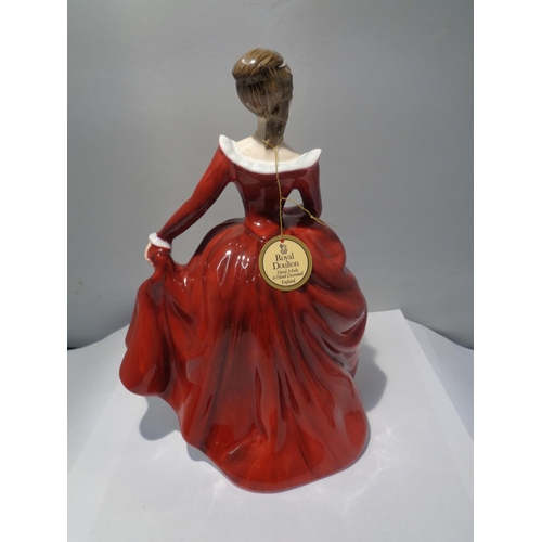 711 - A ROYAL DOULTON FIGURINE FRAGRANCE SIGNED IN GOLD