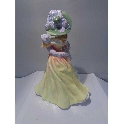 713 - A ROYAL DOULTON FIGURINE KATIE