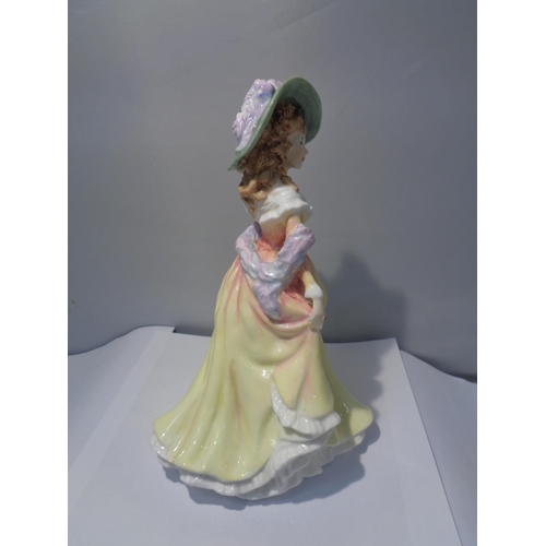 713 - A ROYAL DOULTON FIGURINE KATIE