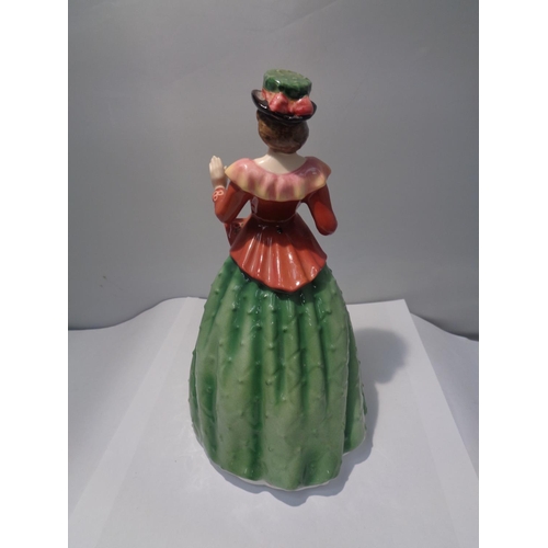 715 - A ROYAL DOULTON FIGURINE HOLLY