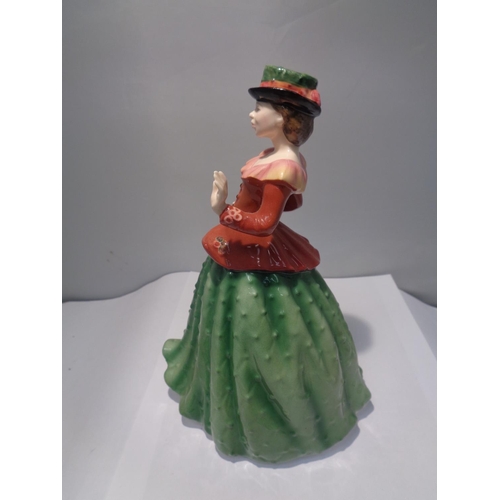 715 - A ROYAL DOULTON FIGURINE HOLLY