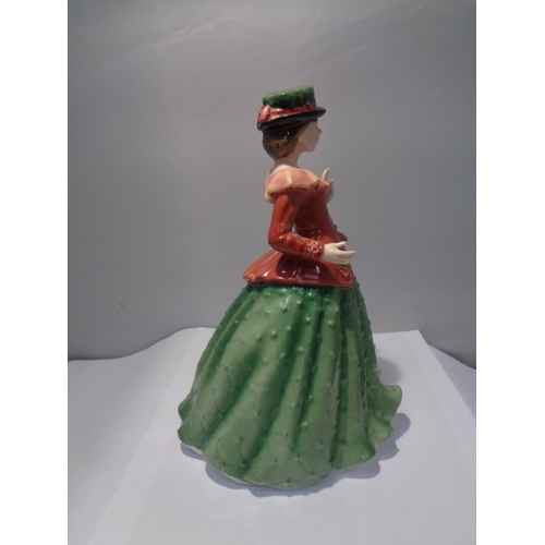 715 - A ROYAL DOULTON FIGURINE HOLLY