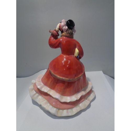 716 - A ROYAL DOULTON FIGURINE CHRISTMAS TIME HN2110