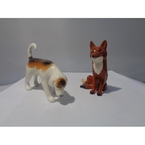 720 - A BESWICK REARING BAY HORSE HUNTSMAN WITH A FOX AND A HOUND