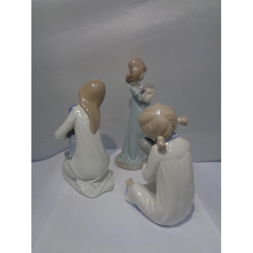 743 - THREE FIGURINES OF GIRLS TO INCLUDE LLADRO AND ZAPHIR