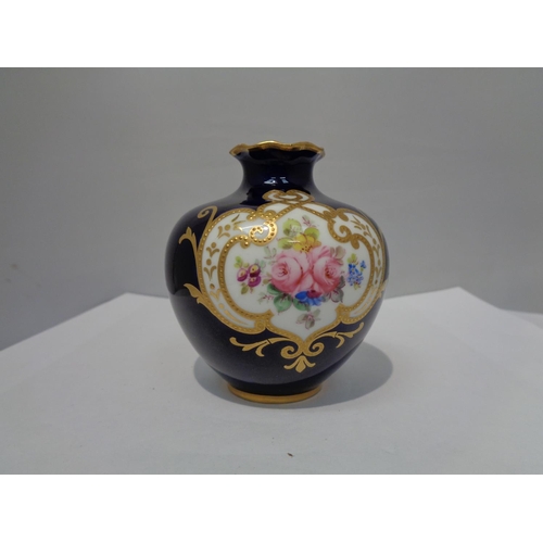 751 - A ROYAL CROWN DERBY VASE