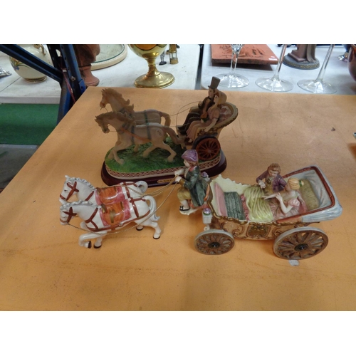 753 - A JULIANNA COUPLE IN A CARRIAGE WITH HORSES N A WOODEN BASE AND A SECOND HORSE DRAWN CARRIAGE WITH C... 