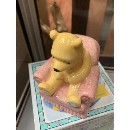 757 - A BOXED ROYAL DOULTON WINNIE-THE-POOH IN ARMCHAIR FIGURE