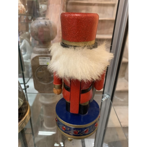 760 - A STEINBACH STYLE NUTCRACKER ON A MUSIC BOX BASE