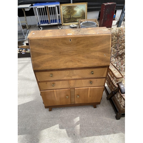 2449 - A SMALL WALNUT BUREAU, 29