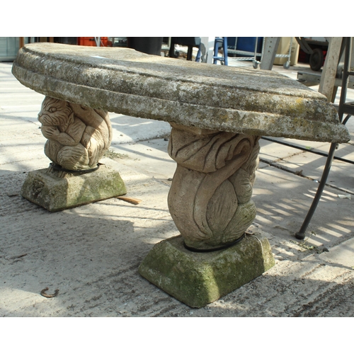 16 - A CONCRETE GARDEN BENCH ON A PEDESTAL BASE NO VAT