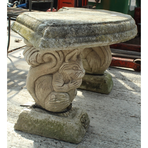 16 - A CONCRETE GARDEN BENCH ON A PEDESTAL BASE NO VAT