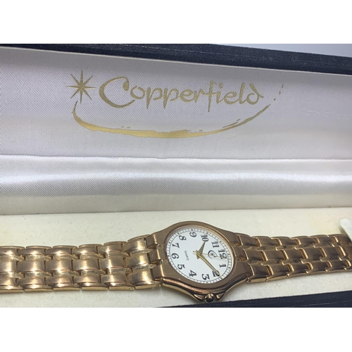 528 - AN AS NEW AND BOXED COPPERFIELD WRIST WATCH SEEN WORKING BUT NO WARRANTY