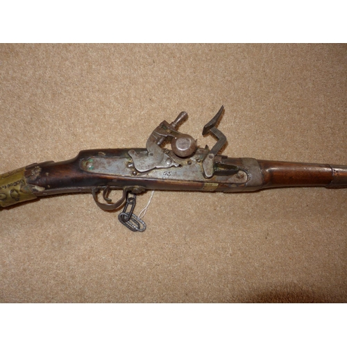 306 - A NORTH AFRICAN .46 CALIBRE MIQUELET LOCK MUSKET, 97CM BARREL, THE STOCK WITH BRASS AND BONE DECORAT... 