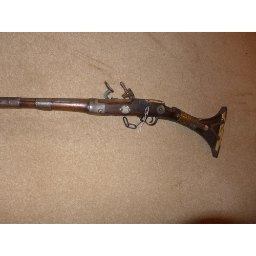 306 - A NORTH AFRICAN .46 CALIBRE MIQUELET LOCK MUSKET, 97CM BARREL, THE STOCK WITH BRASS AND BONE DECORAT... 