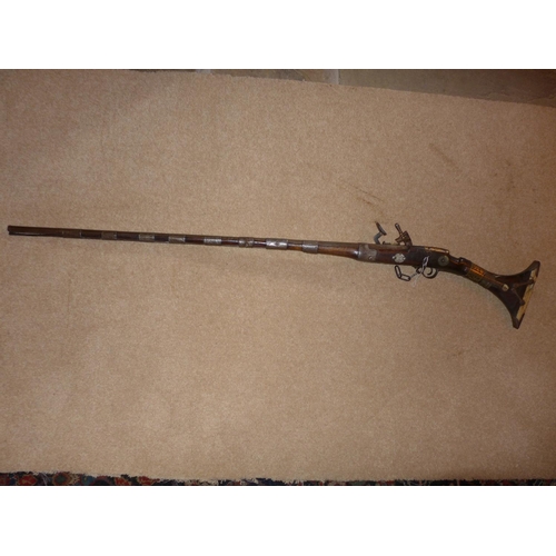 306 - A NORTH AFRICAN .46 CALIBRE MIQUELET LOCK MUSKET, 97CM BARREL, THE STOCK WITH BRASS AND BONE DECORAT... 