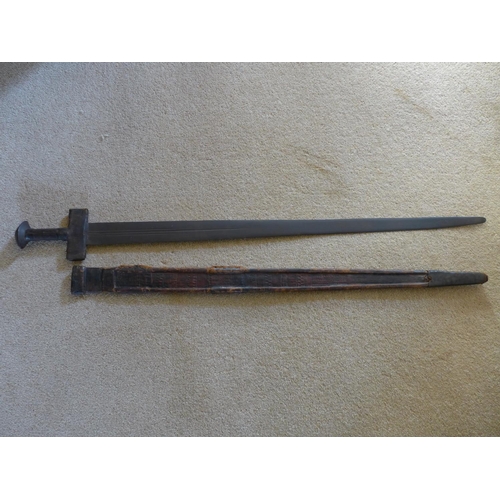 322 - A SUDANESE KASKARA SWORD, 82CM DOUBLE EDGED BLADE, LEATHER GRIP AND SCABBARD