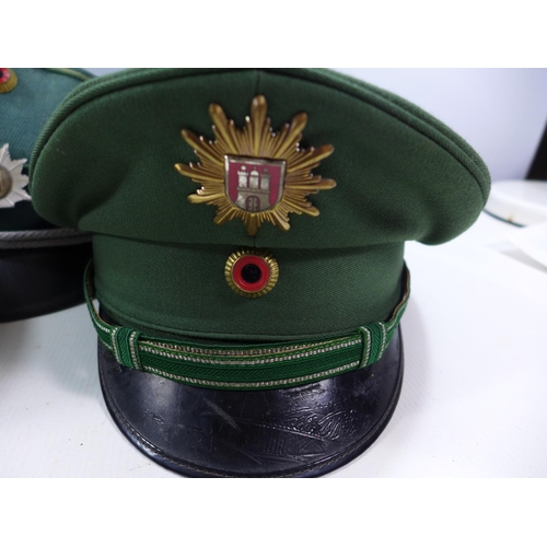 326 - FIVE GERMAN/AUSTRIAN POLICE HATS