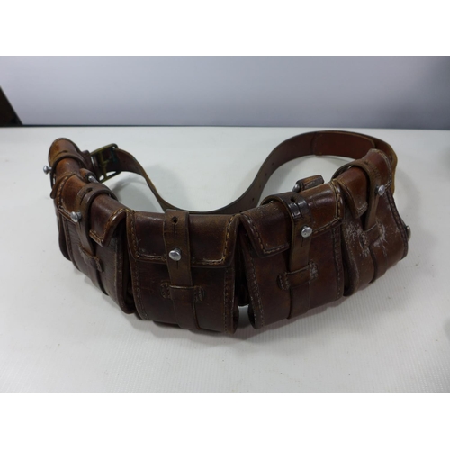 327 - AN EARLY 20TH CENTURY LEATHER FIVE SECTION MILITARY CARTRIDGE BELT