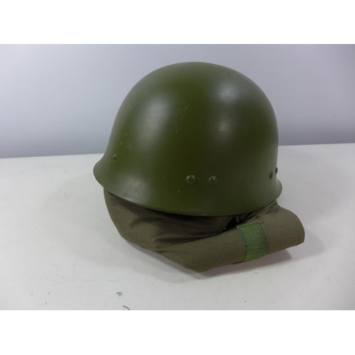 337 - A RUSSIAN HELMET COMPLETE WITH LINING