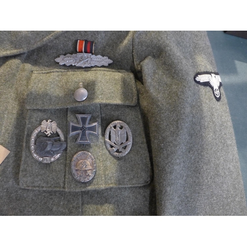 350 - A GOOD QUALITY REPLICA NAZI GERMANY SS UNIFORM SIZE LARGE COMPRISING JACKET WITH ASSORTED BRAVERY AW... 